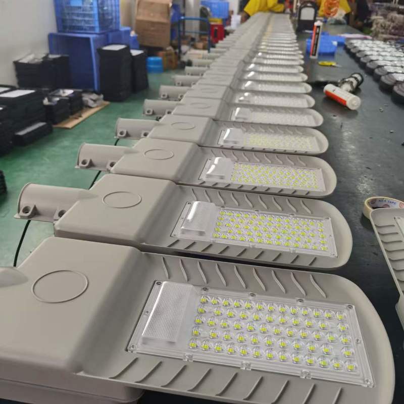 Factory workshop assembly line production, production of LED outdoor street lights, lamp caps 14-0103